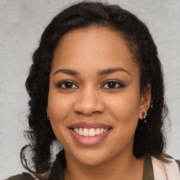 Joyful asian young-adult female with long  brown hair and brown eyes