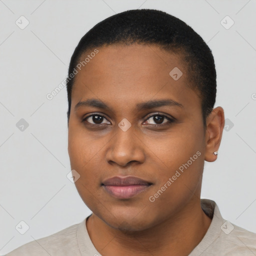 Joyful black young-adult female with short  black hair and brown eyes
