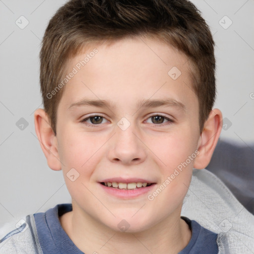 Joyful white child male with short  brown hair and brown eyes