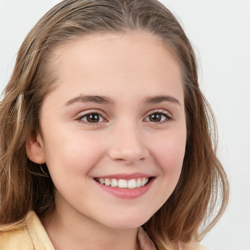 Joyful white child female with long  brown hair and brown eyes