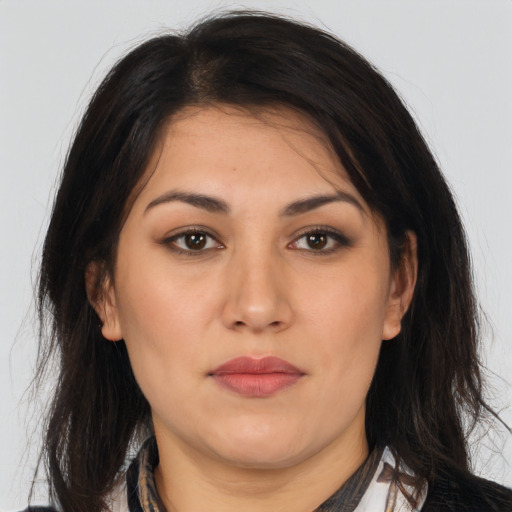 Neutral white young-adult female with long  brown hair and brown eyes