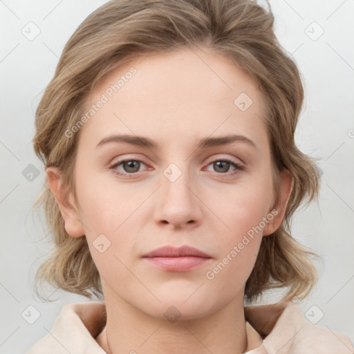 Neutral white young-adult female with medium  brown hair and grey eyes