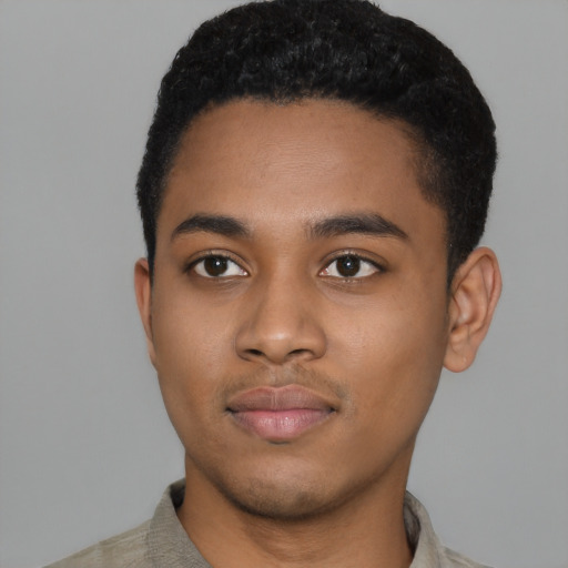 Neutral black young-adult male with short  black hair and brown eyes