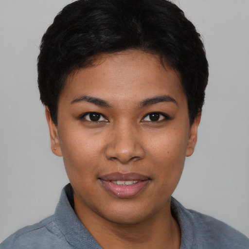 Joyful asian young-adult female with short  brown hair and brown eyes