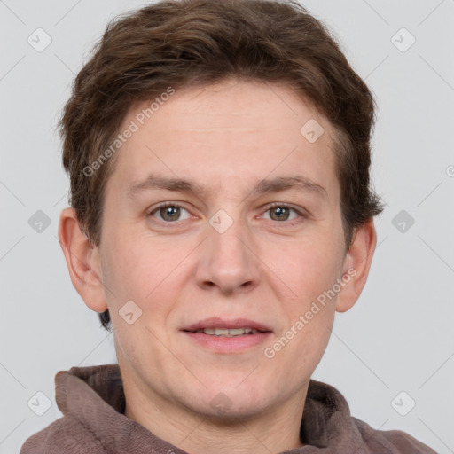 Joyful white adult male with short  brown hair and grey eyes