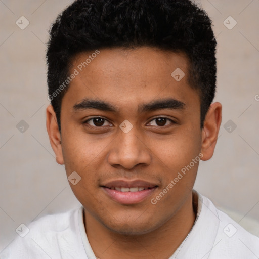 Joyful latino young-adult male with short  brown hair and brown eyes