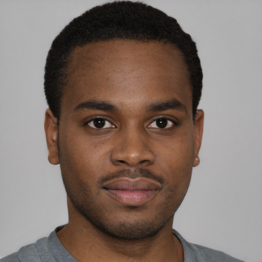 Neutral black young-adult male with short  brown hair and brown eyes