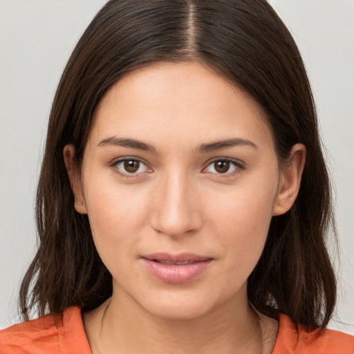 Neutral white young-adult female with medium  brown hair and brown eyes