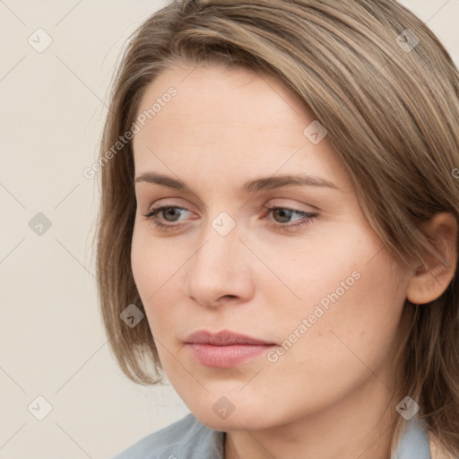 Neutral white young-adult female with medium  brown hair and grey eyes