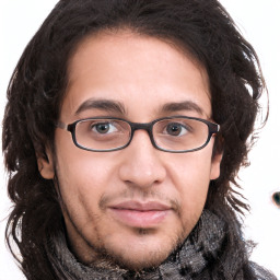Joyful white young-adult male with medium  brown hair and brown eyes