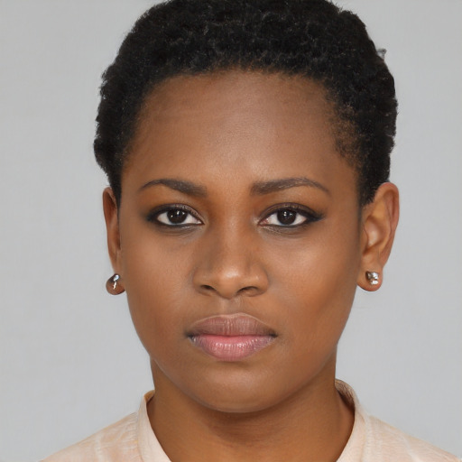 Neutral black young-adult female with short  brown hair and brown eyes