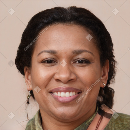 Joyful latino adult female with medium  brown hair and brown eyes