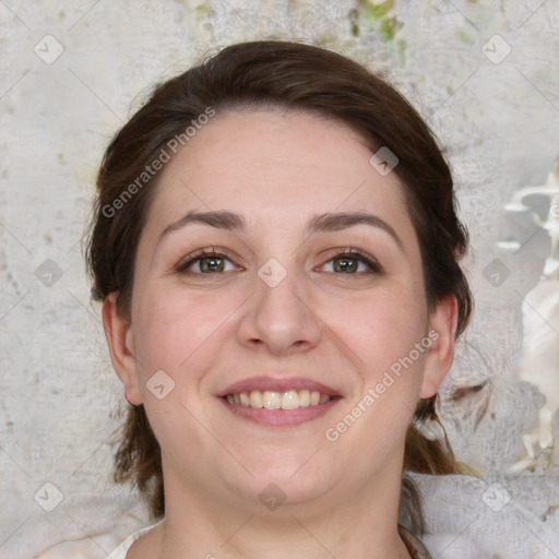 Joyful white young-adult female with medium  brown hair and green eyes