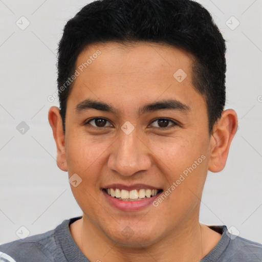 Joyful latino young-adult male with short  brown hair and brown eyes