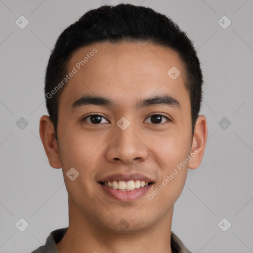 Joyful latino young-adult male with short  brown hair and brown eyes