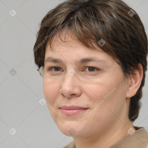 Joyful white adult female with medium  brown hair and brown eyes