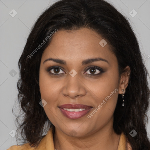 Joyful black young-adult female with long  brown hair and brown eyes