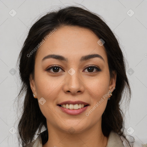 Joyful latino young-adult female with medium  brown hair and brown eyes