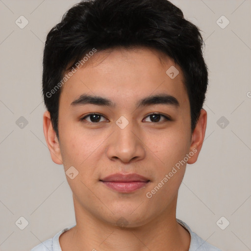 Joyful asian young-adult male with short  black hair and brown eyes