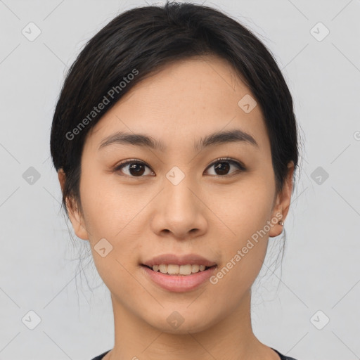 Joyful asian young-adult female with medium  brown hair and brown eyes