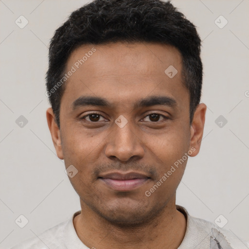 Joyful latino young-adult male with short  black hair and brown eyes