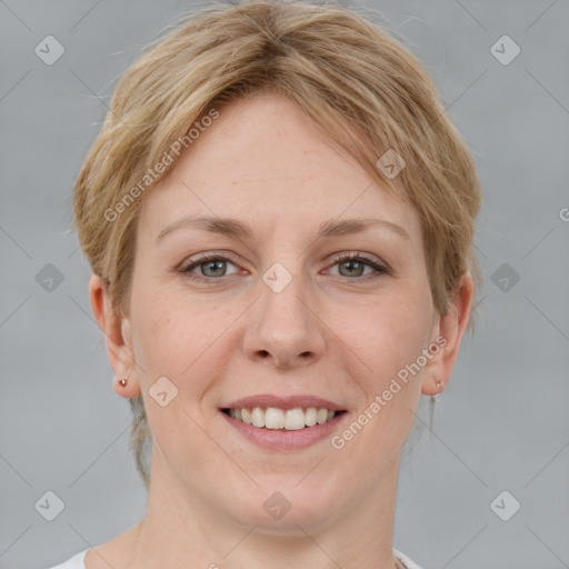 Joyful white young-adult female with medium  brown hair and blue eyes