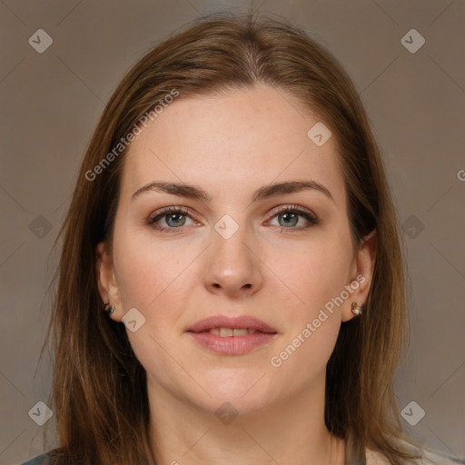 Joyful white young-adult female with long  brown hair and grey eyes