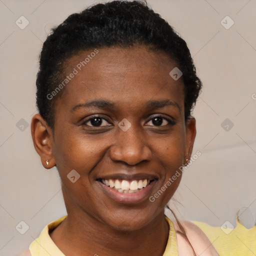 Joyful black young-adult female with short  brown hair and brown eyes