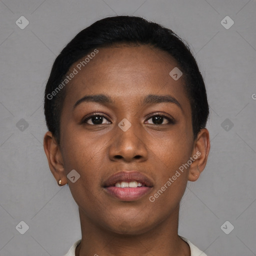 Joyful black young-adult female with short  brown hair and brown eyes