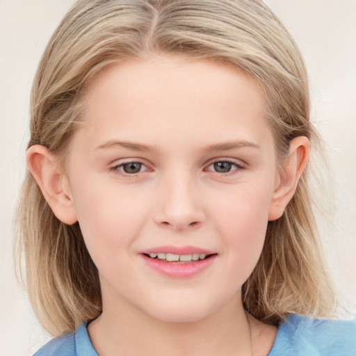 Joyful white child female with medium  brown hair and blue eyes