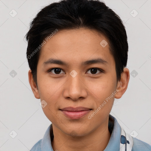 Joyful asian young-adult male with short  black hair and brown eyes