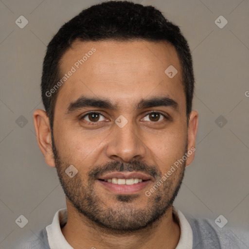 Joyful white young-adult male with short  black hair and brown eyes