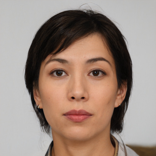 Neutral asian young-adult female with medium  black hair and brown eyes