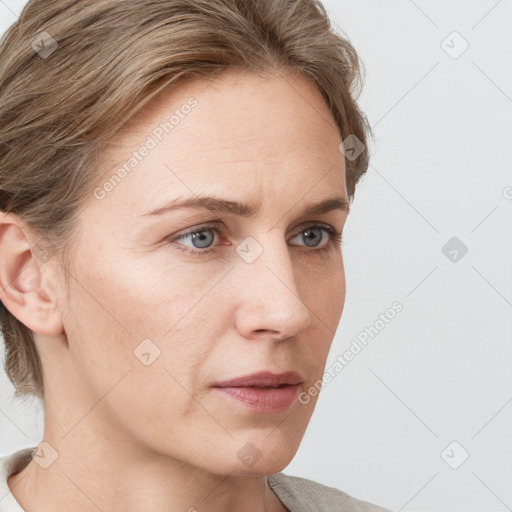 Neutral white young-adult female with short  brown hair and grey eyes