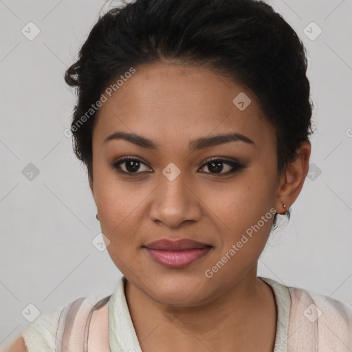 Joyful latino young-adult female with short  brown hair and brown eyes