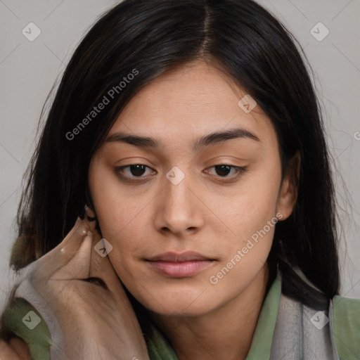 Neutral asian young-adult female with medium  brown hair and brown eyes