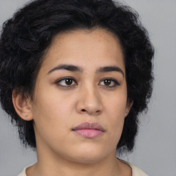 Neutral asian young-adult female with medium  black hair and brown eyes