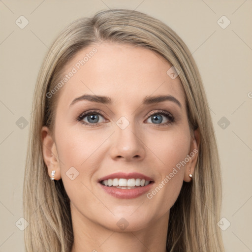 Joyful white young-adult female with long  brown hair and blue eyes