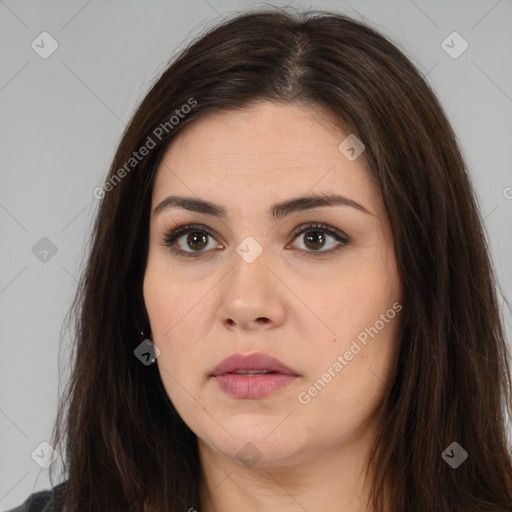 Neutral white young-adult female with long  brown hair and brown eyes