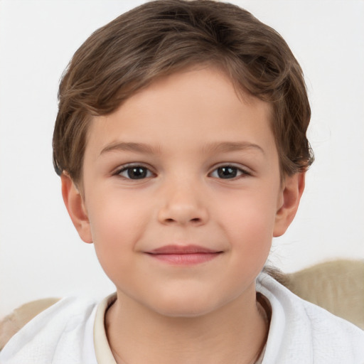 Joyful white child female with short  brown hair and brown eyes