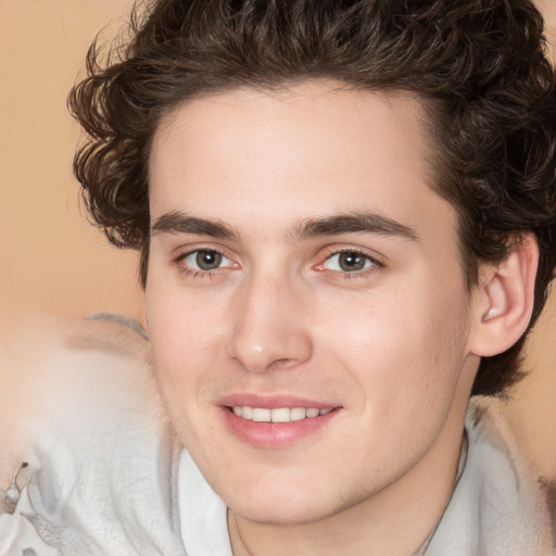 Joyful white young-adult male with medium  brown hair and brown eyes