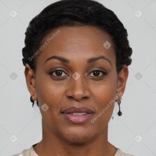 Joyful black young-adult female with short  brown hair and brown eyes