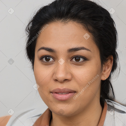 Joyful latino young-adult female with medium  brown hair and brown eyes