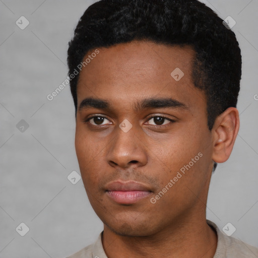 Neutral black young-adult male with short  black hair and brown eyes