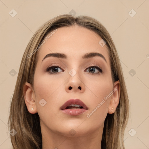 Neutral white young-adult female with long  brown hair and brown eyes