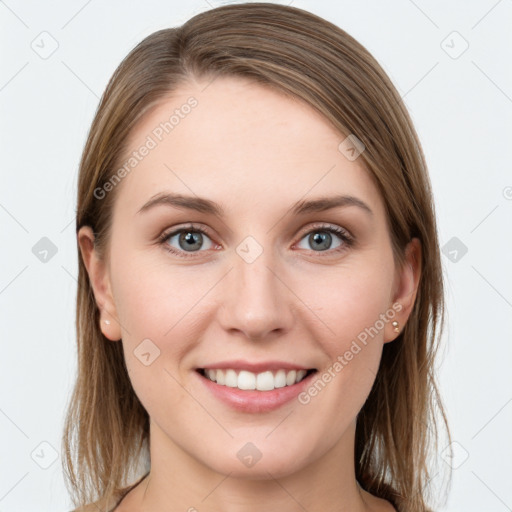 Joyful white young-adult female with long  brown hair and grey eyes