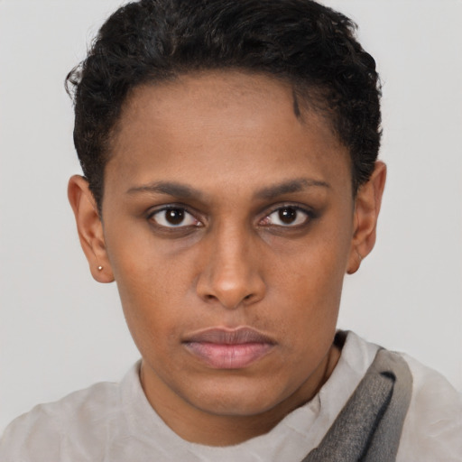 Neutral black young-adult female with short  brown hair and brown eyes