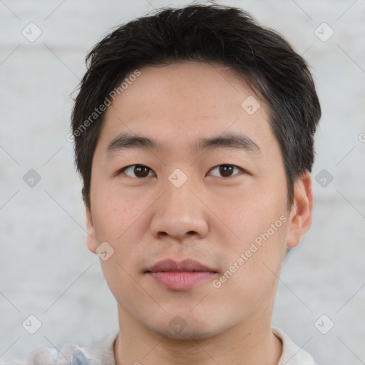 Neutral asian young-adult male with short  brown hair and brown eyes