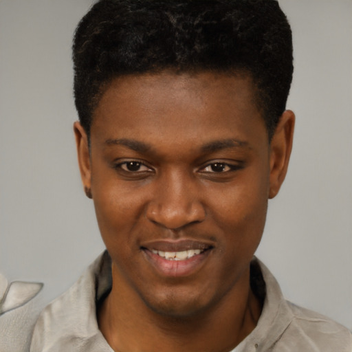 Joyful latino young-adult male with short  brown hair and brown eyes