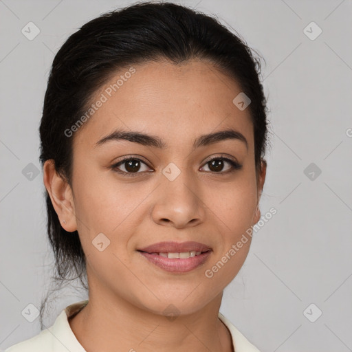 Joyful latino young-adult female with medium  brown hair and brown eyes